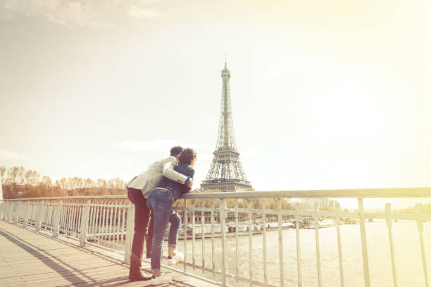 istock Multi-ethnic couple having fun in Paris near Eiffel Tower 545112598