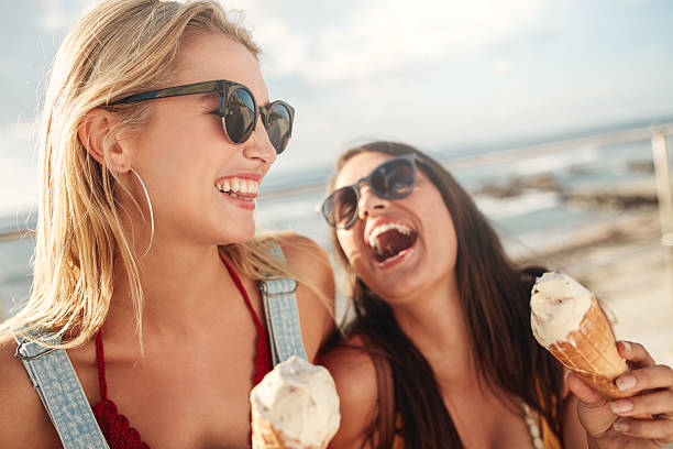 istock Best friends together outdoors with ice cream 545116572