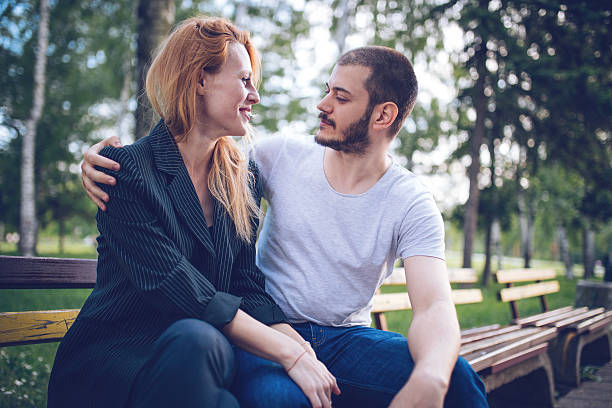 istock Couple in park hugging 545116858