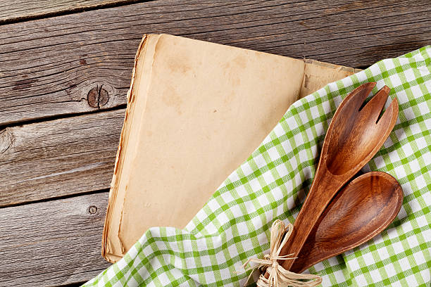 istock Blank vintage cooking book and utensils 545120480