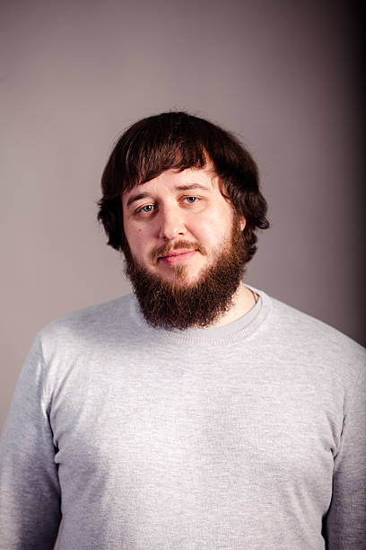 istock Portrait of tattooed bearded man 545120924