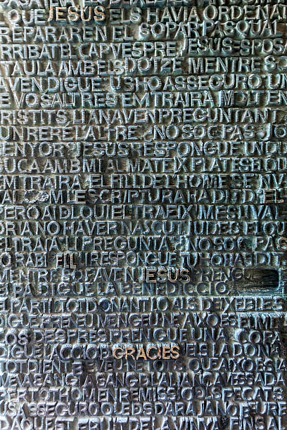 istock Words from the Bible in various languages. Relief. 545120986