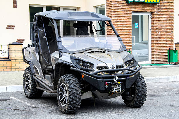 BRP Commander Limited Chelyabinsk region, Russia - July 15, 2012: Quad bike BRP Commander Limited is parked at the parking near the interurban freeway. 4 wheel motorbike stock pictures, royalty-free photos & images