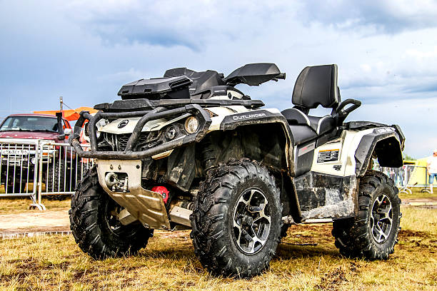 Can-Am BRP Outlander Novyy Urengoy, Russia - June 25, 2016: Quad bike Can-Am BRP Outlander is parked at the countryside. motorcycle 4 wheels stock pictures, royalty-free photos & images