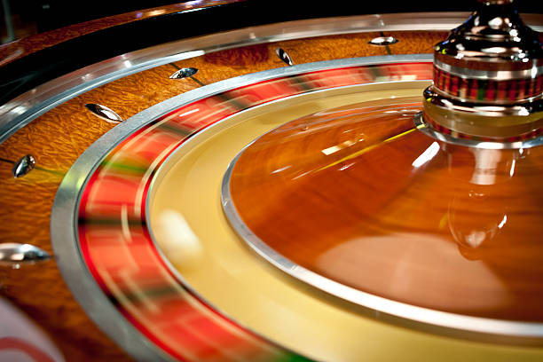 spinning roulette wheel - last opportunity emotional stress green stock-fotos und bilder