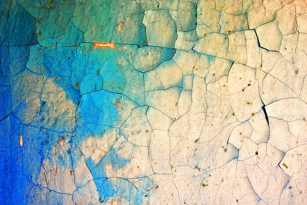 istock Grunge wall with cracks and peeling paint in old house. 545122586