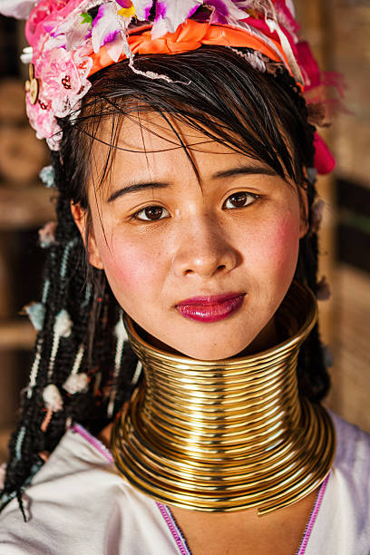 Woman from Long Neck Karen Tribe, Thailand, Asia Portrait of a long-neck woman Padaung (Karen) tribe, Mae Hong Son Province in Northern Thailand. padaung tribe stock pictures, royalty-free photos & images