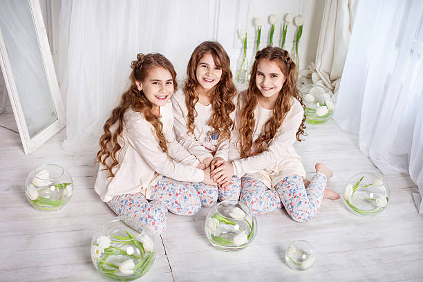 istock Portrait of three young charming sisters 545125258