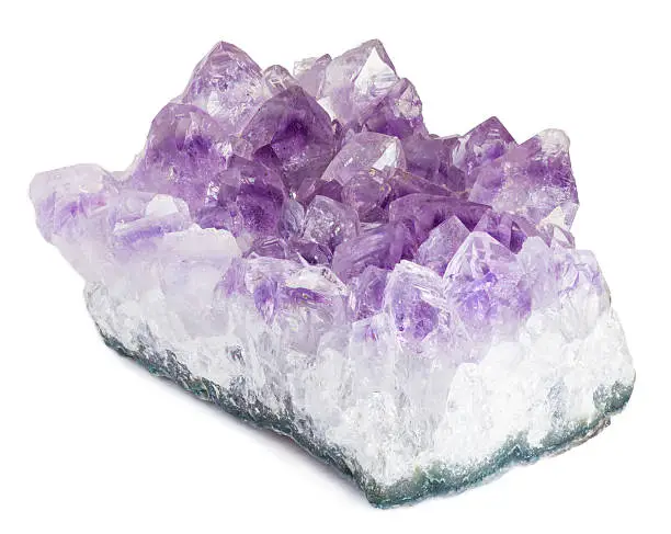 Purple amethyst stone isolated on white with clipping path