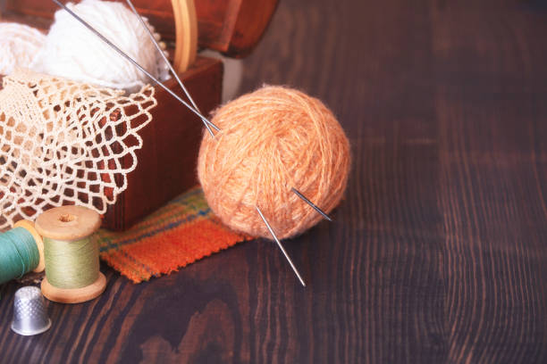 istock Casket with needlework and beige skein of thread 545239350