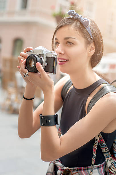 istock Beautiful female photographer 545243604