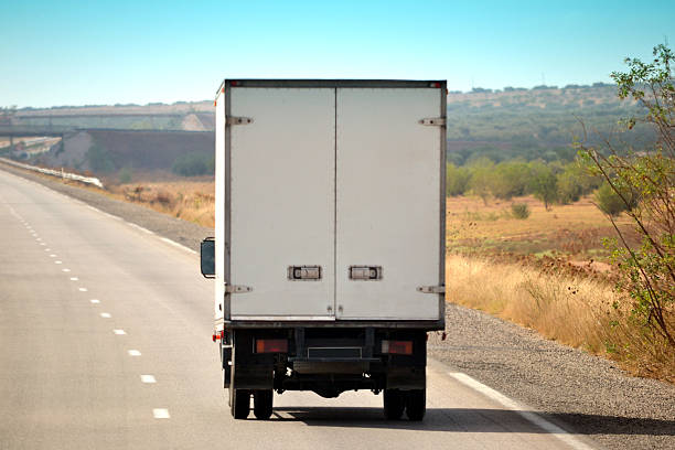 Truck on a road, logistics stock photo