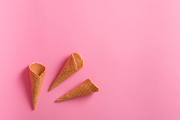 istock ice cream cones on pink background 545245670