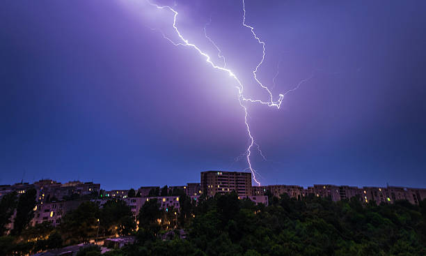istock Lightnings above the city in a summer night 545247208