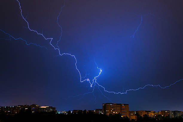 istock Lightnings above the city in a summer night 545247228