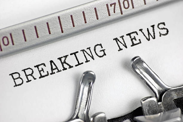 istock Typewriter detailed macro closeup typing text Breaking News, large macro 545251438