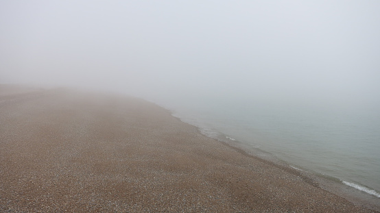 Brighton Beach, UK, in the fog