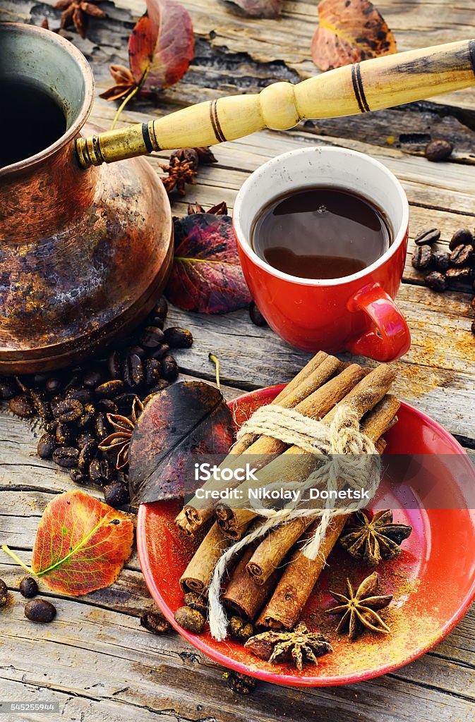 Coffee in the autumn season Cup of coffee,fallen autumn leaves and coffee beans Autumn Stock Photo