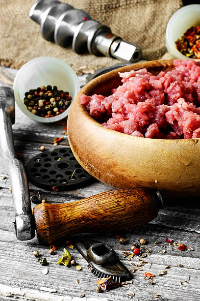 istock meat ground in meat grinder 545256070