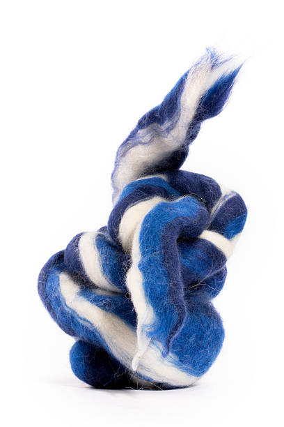 istock Hank Merino wool white and blue on a white background 545256154