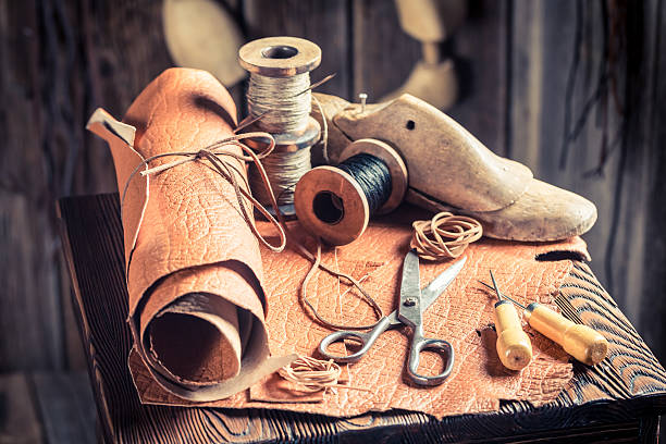 cobbler workshop with leather, threads and tools - belt personal accessory leather fashion imagens e fotografias de stock