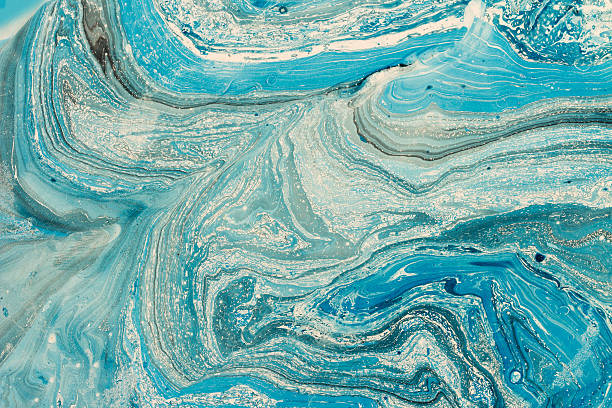 istock Blue marbling texture. Creative background with abstract oil painted waves 545260514