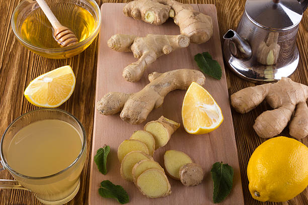 istock Cup of ginger tea with honey and lemon. 545261748
