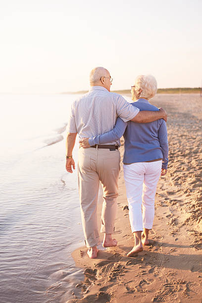 istock Two senior adults by the ocean 545262188