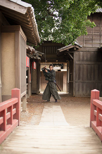 istock Fierce Japanese Samurai in the village streets 545262840