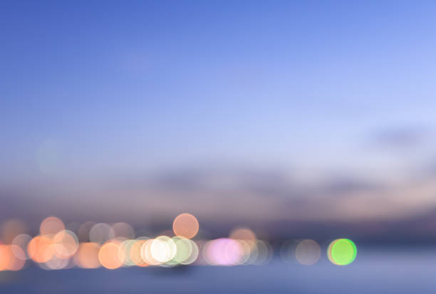 istock Blurred view of city bokeh with pink sky background 545262846