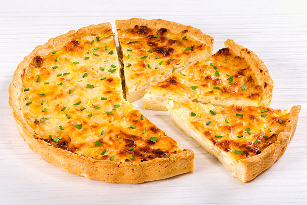 istock onion cheese quiche or pie sprinkled with parsley 545263850