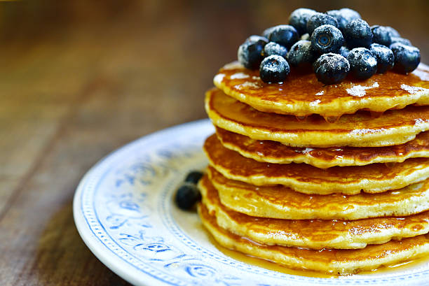 istock Pancakes with honey and blueberry.Top view. 545264826