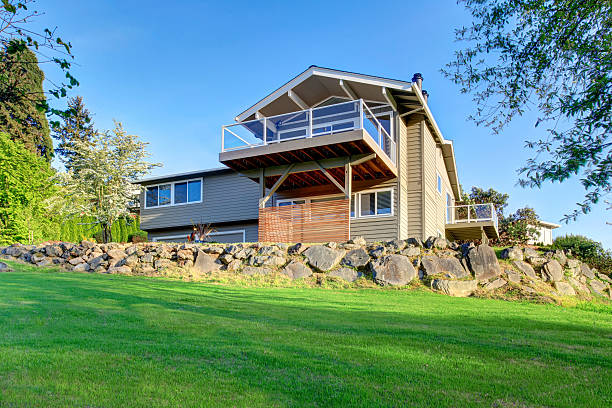 istock Two story house exterior with gray siding 545267252