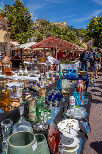 Nice, France - June 11, 2012: A busy street market in the port of Nice on the Cote d'Azur on the French Riviera in the South of France.
