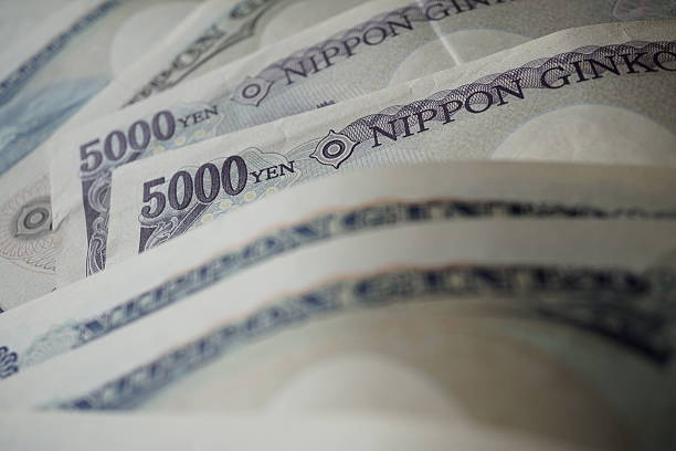 istock Japanese currency (yen)  on the wooden background 545268966