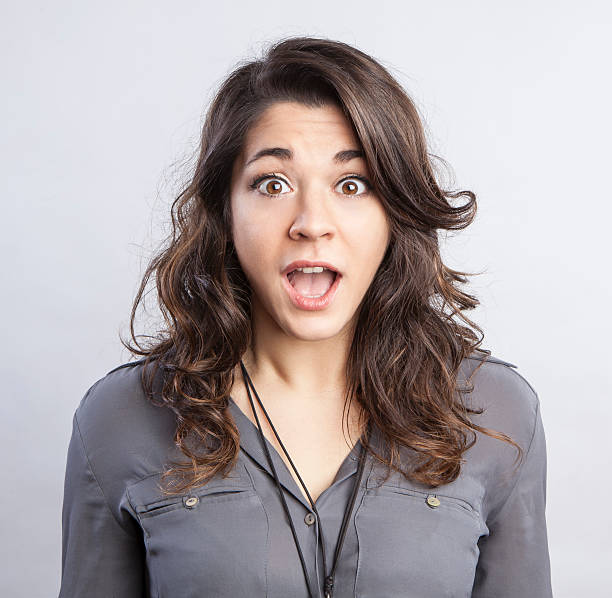 istock young beautiful woman with a surprised face expression 545270630