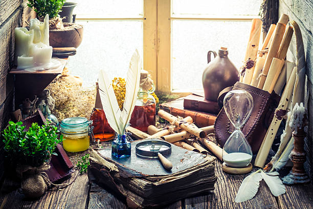 istock Unique witch workshop full of scrolls and recipe 545271356