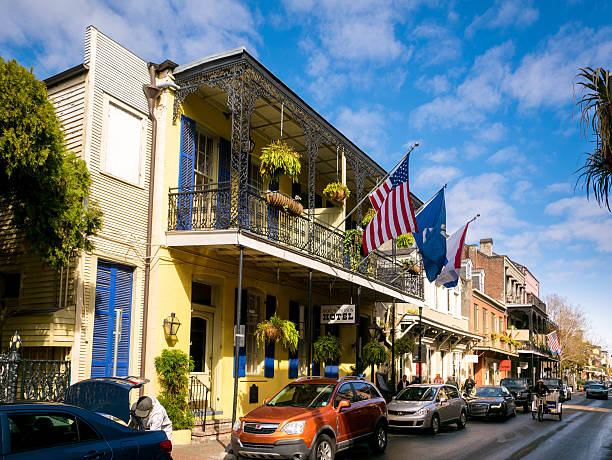 Houses in the Marigny neighborhood of New Orleans, Louisiana with the Louisiana state flag.