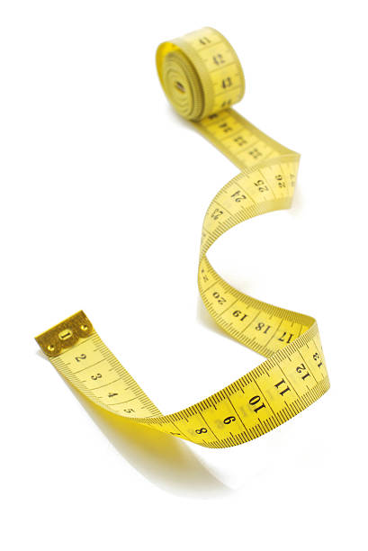 istock measuring tape on white background 545271860