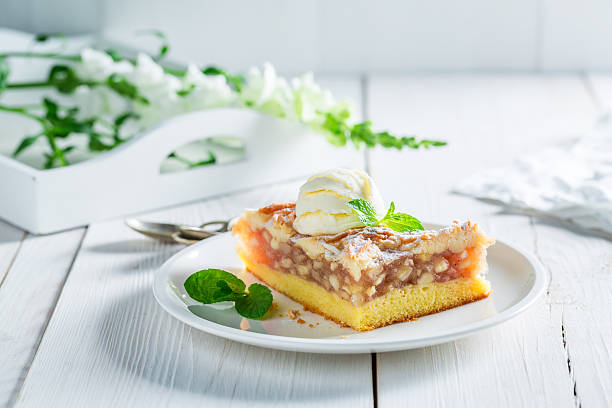 istock Tasty apple pie and ice cream with mint leaves 545272344