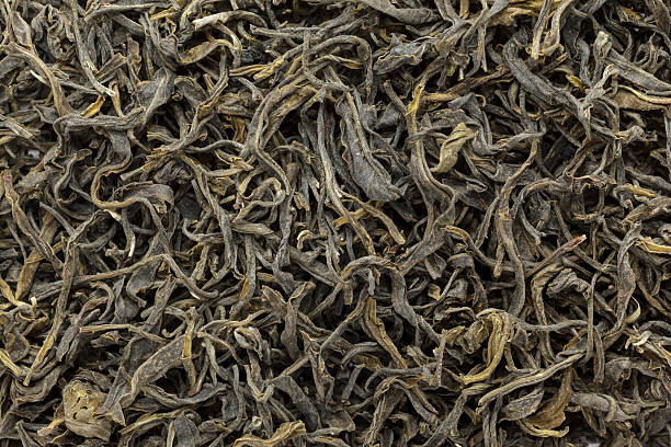 istock Organic Green Tea (Camellia sinensis) dried long leaves. 545273092