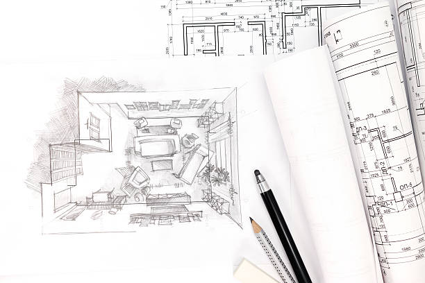 istock concept of home renovation with architectural drawing and blueprints 545274276