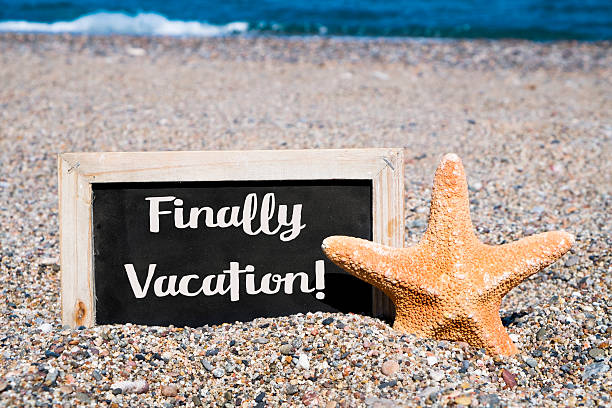 istock starfish and chalkboard with the text finally vacation 545276304