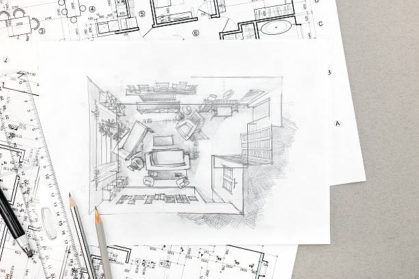 istock hand drawing sketch of home interior with pencils and blueprints 545276426