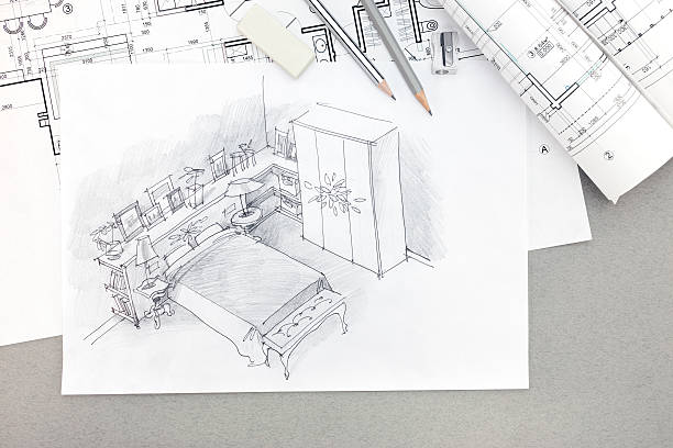 istock architectural sketch of bedroom with blueprints, pencils, eraser 545276592