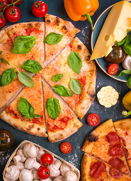istock Delicious baked sliced pizza 545278862