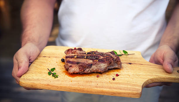 istock BBQ steak. Barbecue grilled beef steak meat 545279446