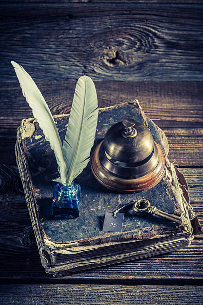 istock Vintage front desk in hotel with guestbook and keys 545280026