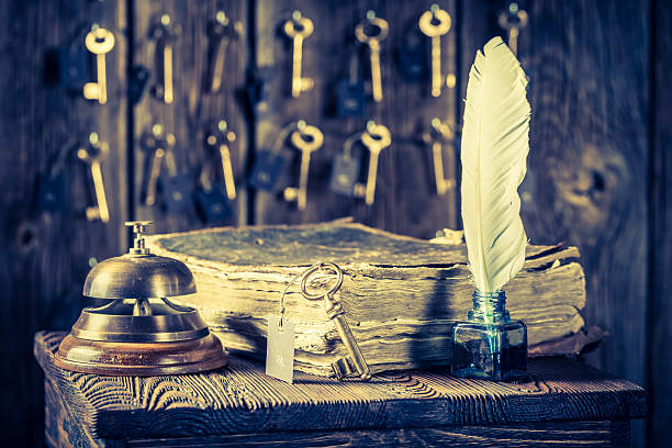 istock Guestbook and keys for rooms in old reception in hotel 545280312