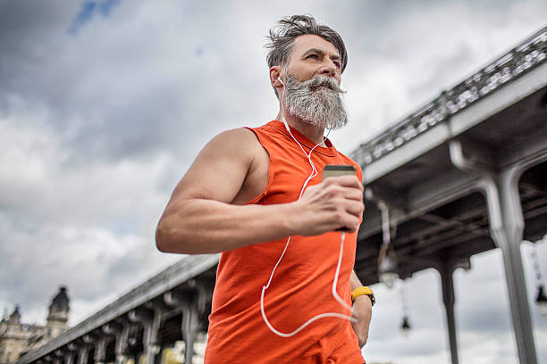 Senior man running in the city